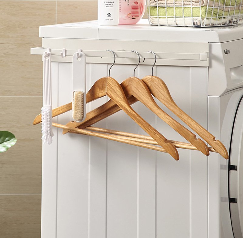 Metal magnetic hanger, which can be placed on the side of the washing machine to hang clothes hangers, brushes, racks, etc