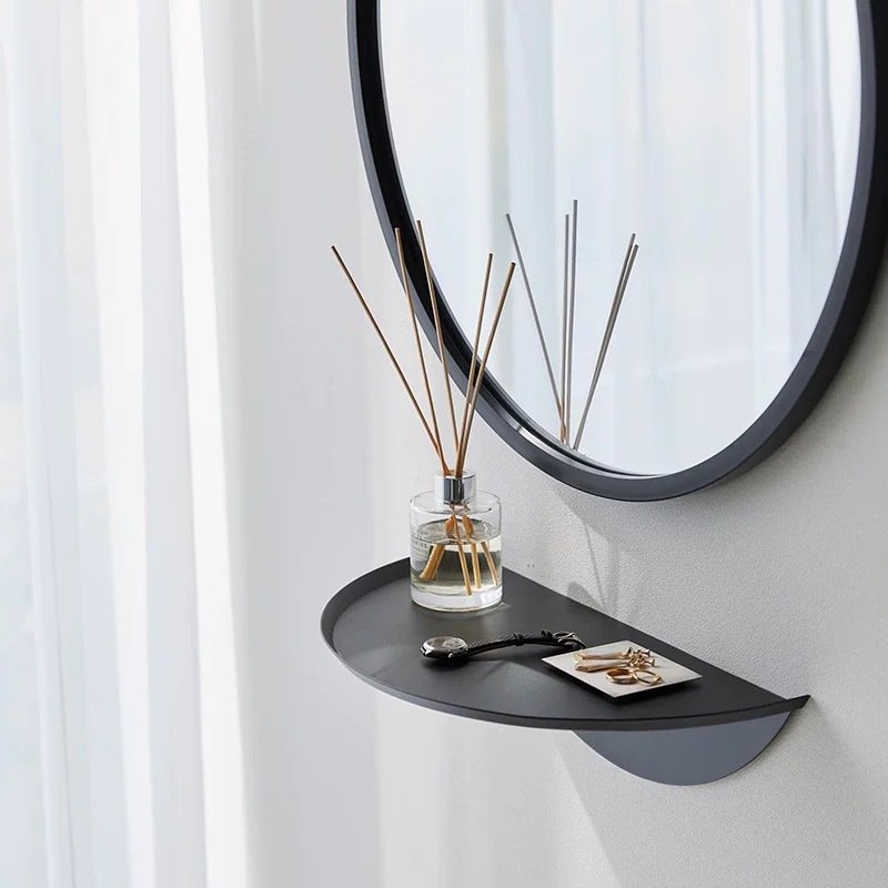 Wall-mounted semicircular storage tray which can be placed in the bedroom or hallway and is used to hold small items